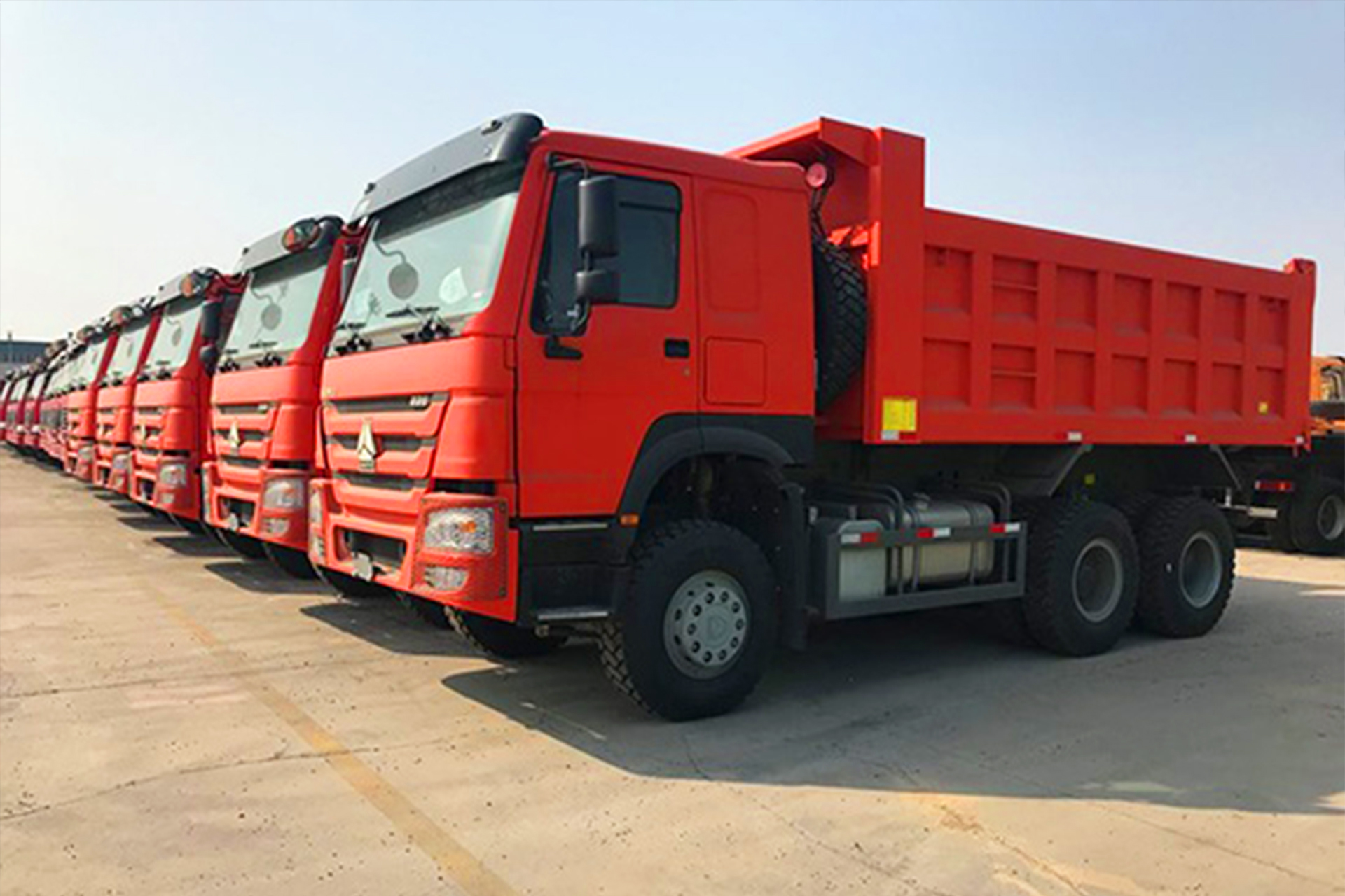 Dump Trucks {{brizy_dc_image_alt imageSrc=