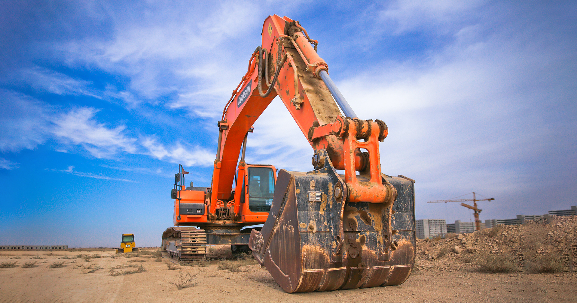 Excavator On Field {{brizy_dc_image_alt imageSrc=
